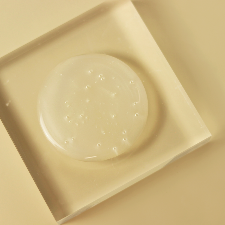 Actiiv Recover Thickening Shampoo Treatment for Women dispensed onto plate to show product texture